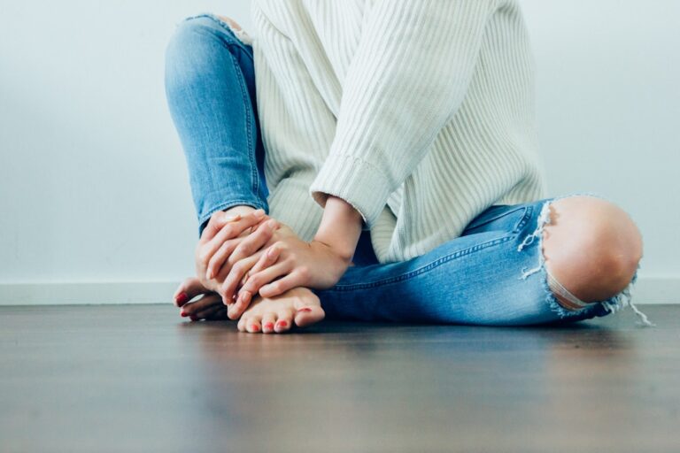Person experiencing a muscle spasm or cramp