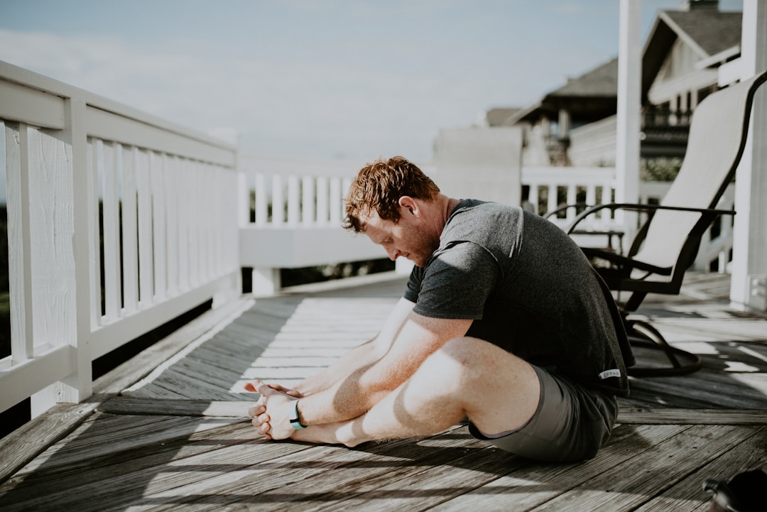 Man stretching his back outdoors in the morning