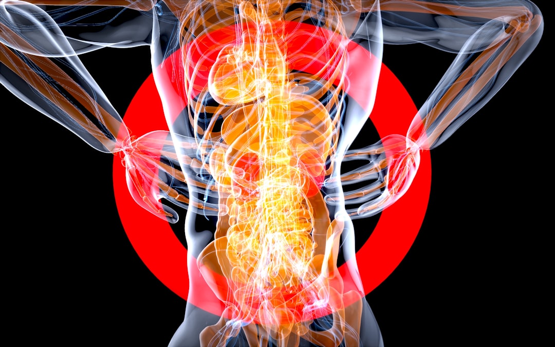 Person experiencing lower back and sciatic pain