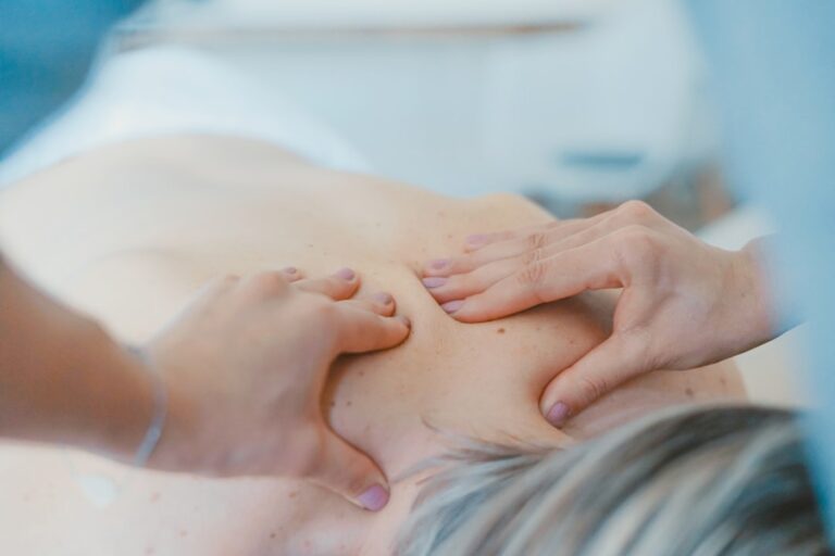 Massaging a sore shoulder