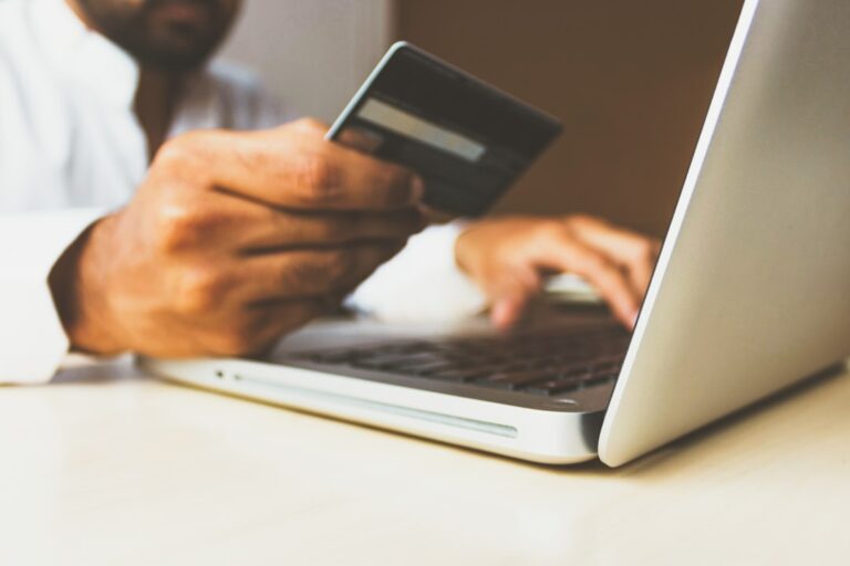 Person shopping online with a credit card