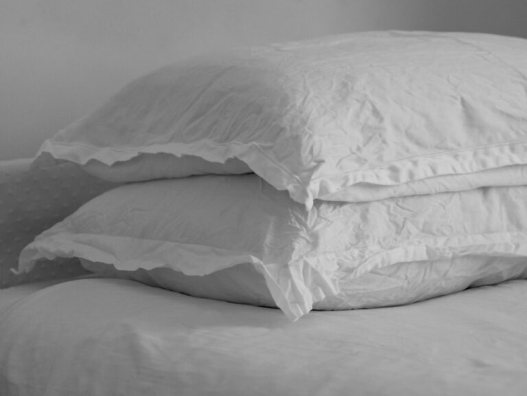 Wrinkled linen pillow on a bed